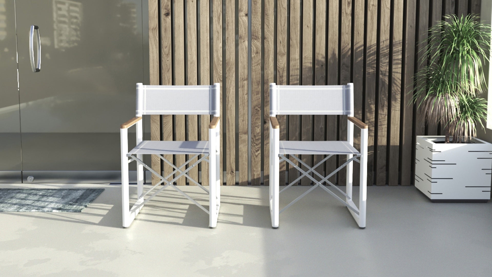Two white Aleta director chairs with gray fabric and teak armrests, against a slatted wood wall.