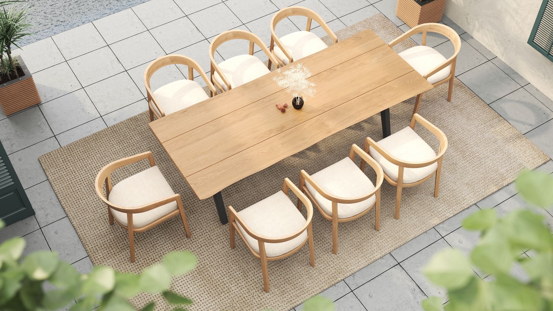 Top-down view of an outdoor dining set with a long table and eight curved-back wooden dining chairs.