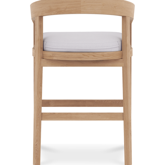 Back view of Vento counter stool with natural teak wood frame and white cushioned seat upholstery.