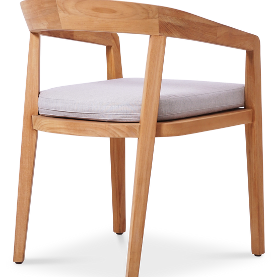 Three-quarter view of a modern wooden dining chair with a light-color cushioned seat by Be A Little.