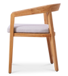 Side view of a new wooden outdoor dining chair with a curved back & a light cushion by Be A Little.