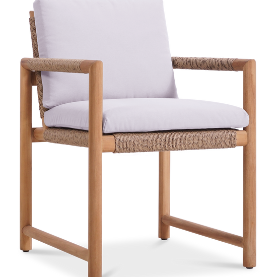 Timo dining armchair made of solid teak with rope-wrapped frame and white seat and back cushions.