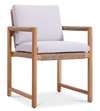 Timo dining armchair made of solid teak with rope-wrapped frame and white seat and back cushions.