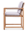 Side view of the Timo dining armchair with premium teak wood frame, rope details, & white cushions.